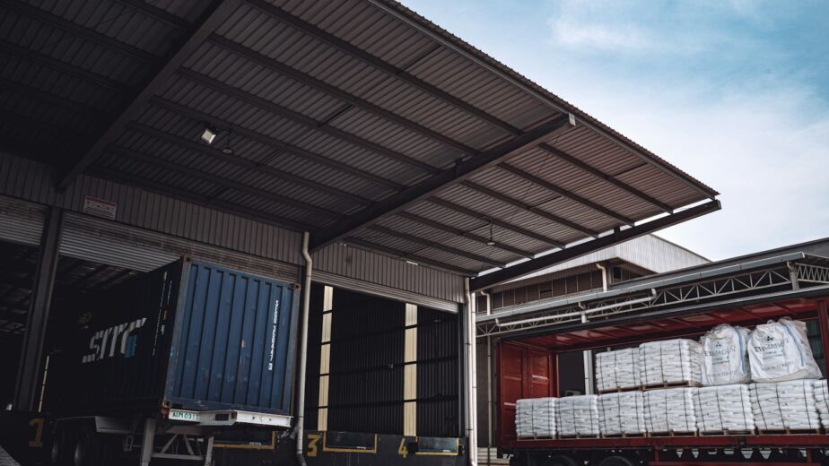 Curtainsider trailer being loaded at a warehouse