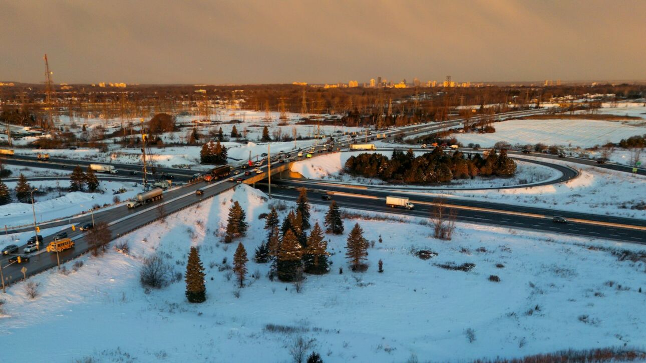 Truck on a snowy highway, aerial view