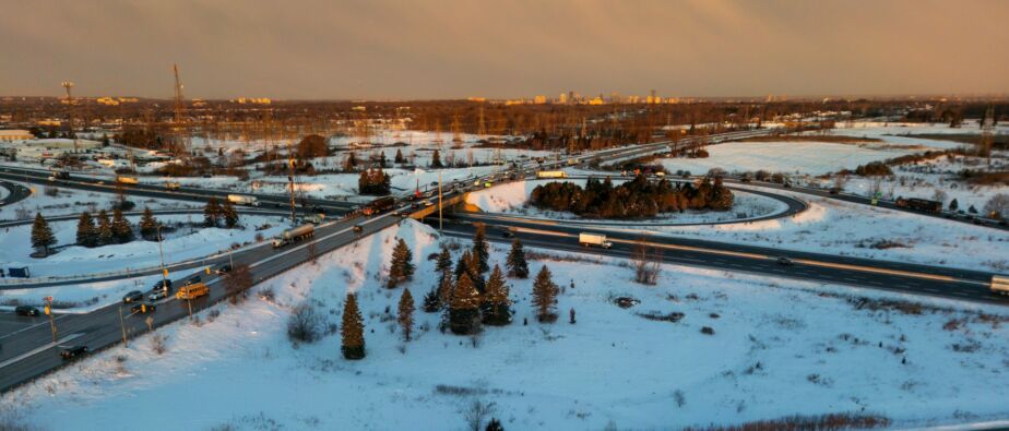 Truck on a snowy highway, aerial view